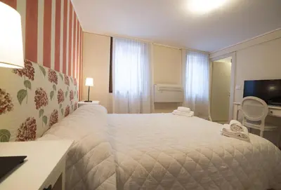 Letto o letti in una camera di Casa delle Ortensie
