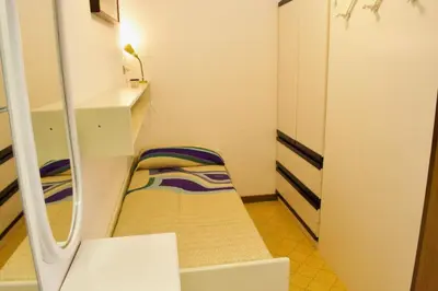 Letto o letti in una camera di Appartamento SOYUS 10