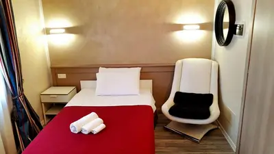 Letto o letti in una camera di Ai Colli