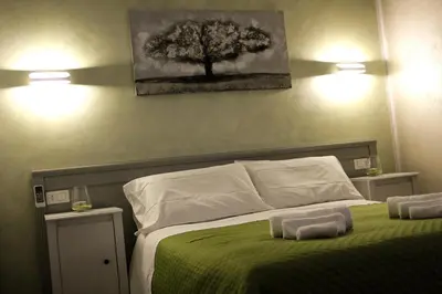 Letto o letti in una camera di Ai Colli
