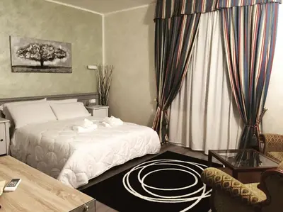 Letto o letti in una camera di Ai Colli