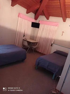 Letto o letti in una camera di Locanda Alla Stazione