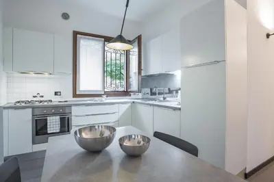 Cucina o angolo cottura di Filodrammatici Loft by Welc(H)ome