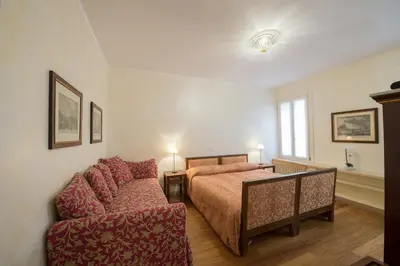 Letto o letti in una camera di Romantic Suite San Marco