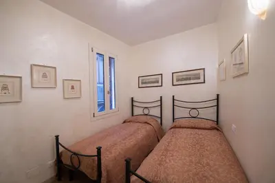 Letto o letti in una camera di Romantic Suite San Marco