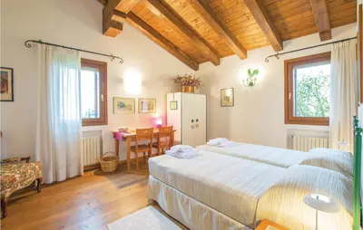 Letto o letti in una camera di La Ghiandaia
