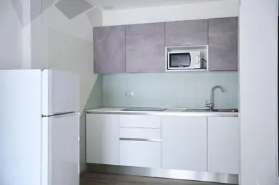 Cucina o angolo cottura di Appartamenti Residence Marcello-Piazza Torino-Lido di Jesolo