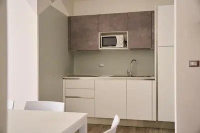 Cucina o angolo cottura di Appartamenti Residence Marcello-Piazza Torino-Lido di Jesolo