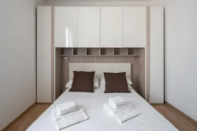 Letto o letti in una camera di San Polo Canal View Apartments by Wonderful Italy