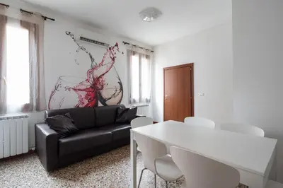 Area soggiorno di San Polo Canal View Apartments by Wonderful Italy