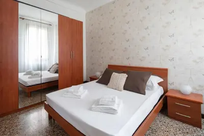 Letto o letti in una camera di San Polo Canal View Apartments by Wonderful Italy