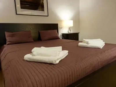 Letto o letti in una camera di Ca' Moretta