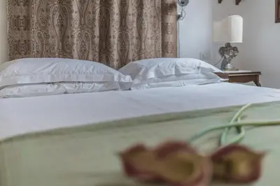 Letto o letti in una camera di Three Terraces