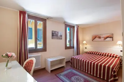 Letto o letti in una camera di Venice Resorts GuestHouse vicino Piazzale Roma e Stazione