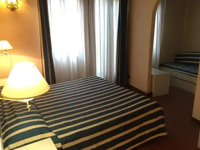 Letto o letti in una camera di Venice Resorts GuestHouse vicino Piazzale Roma e Stazione
