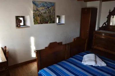 Letto o letti in una camera di Ca Borgh