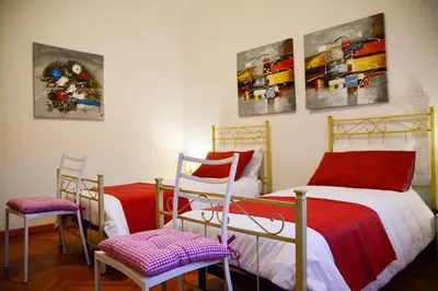 Letto o letti in una camera di Casa Bianca