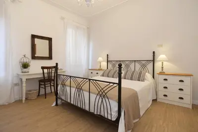 Letto o letti in una camera di Secret Garden Venice