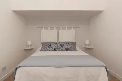 Letto o letti in una camera di Secret Garden Venice