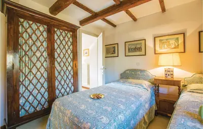 Letto o letti in una camera di Il Glicine
