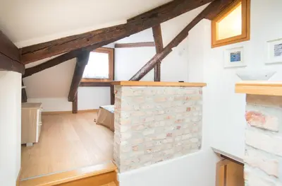 Letto o letti in una camera di WellVenice Campiello