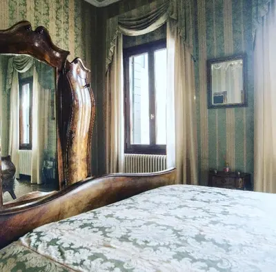 Letto o letti in una camera di Cà Martinengo