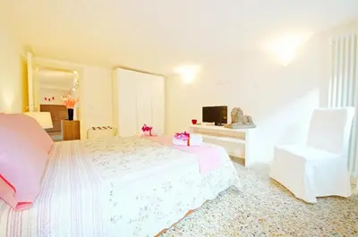 Letto o letti in una camera di Sant'Aponal Apartment Rialto