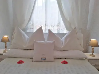 Letto o letti in una camera di San Luca Apartment