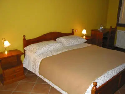 Letto o letti in una camera di Agriturismo Alto Venda