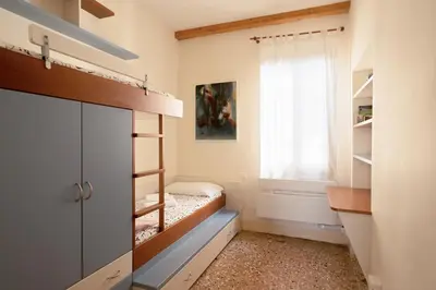 Letto o letti in una camera di Cà Venier