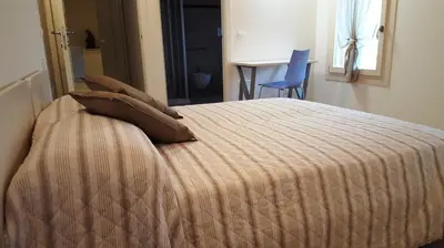 Letto o letti in una camera di Boschetto di Campagna