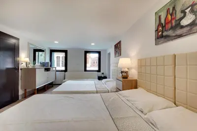 Letto o letti in una camera di CA' ARSENALE