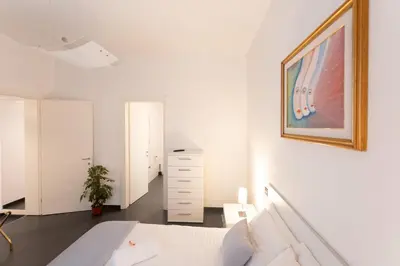 Letto o letti in una camera di Cà Sottomarina gli Appartamenti in Centro Apartsuite