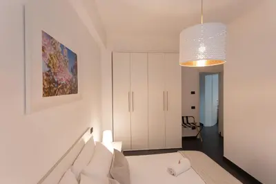 Letto o letti in una camera di Cà Sottomarina gli Appartamenti in Centro Apartsuite