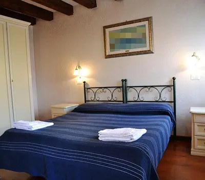 Letto o letti in una camera di Oceano Mare B&B