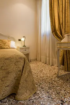 Letto o letti in una camera di Angeles Inn