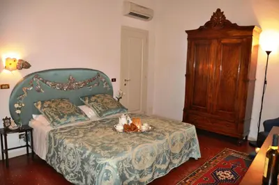 Letto o letti in una camera di Henry's Heaven Apartment