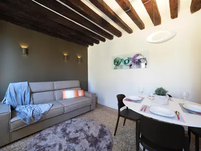 Area soggiorno di Majestic Rialto House by Wonderful Italy