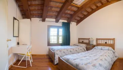 Letto o letti in una camera di Villa Peschiera
