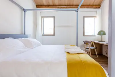 Letto o letti in una camera di Casa Burano