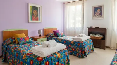 Letto o letti in una camera di Casa sul Cielo di Burano