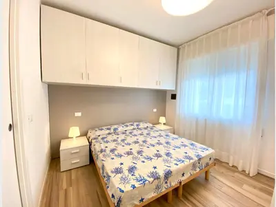 Letto o letti in una camera di Appartamenti Cristina - Carraro Immobiliare - Family Apartments