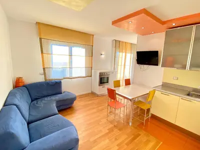 TV o dispositivi per l'intrattenimento presso Appartamenti Cristina - Carraro Immobiliare - Family Apartments