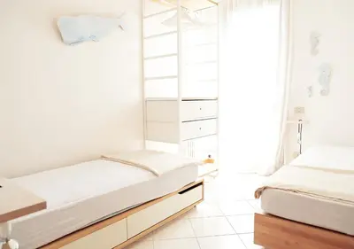 Letto o letti in una camera di Sunny Apartment On The Sea