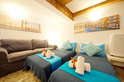 Area soggiorno di Campo San Polo Apartment Rialto