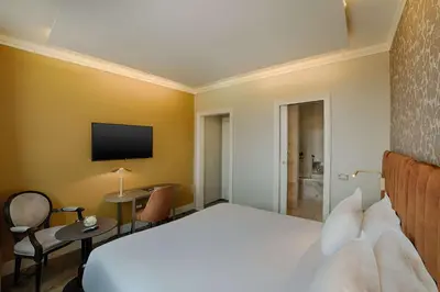 Letto o letti in una camera di NH Venezia Santa Lucia