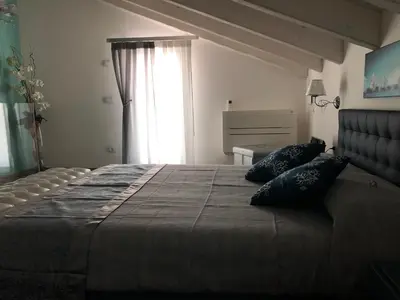 Letto o letti in una camera di Casa Boscolo Luxury