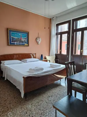 Letto o letti in una camera di Cà Widmann