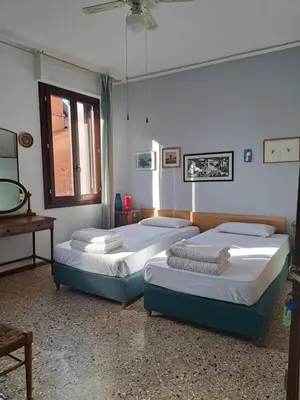 Letto o letti in una camera di Cà Widmann