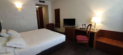 Letto o letti in una camera di Best Western Park Hotel Continental